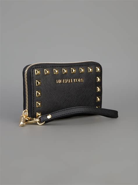 michael kors black logo wristlet|Michael Kors wallet with strap.